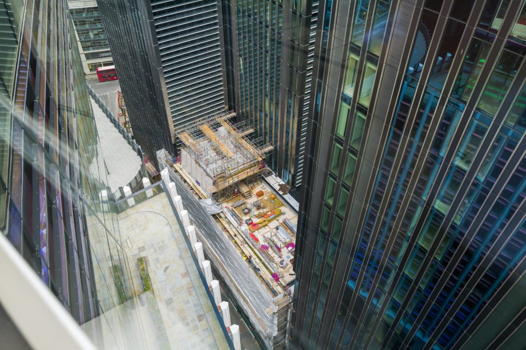 Construction site viewed through a high-rise window in London
