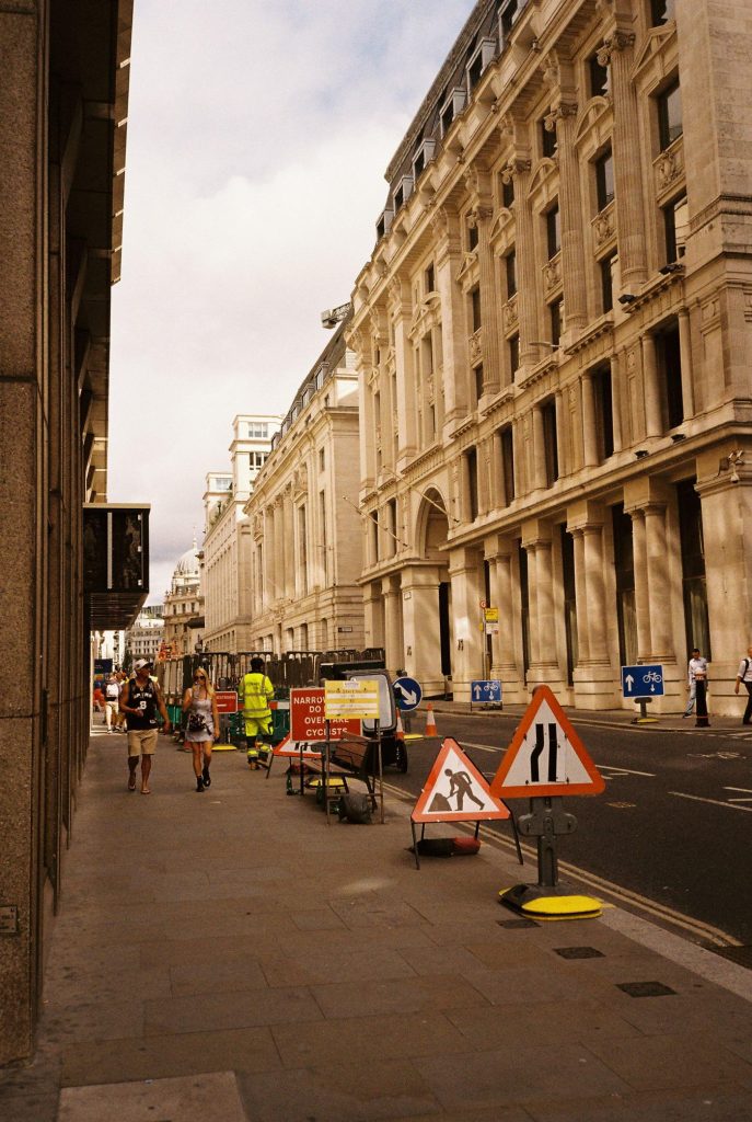 Roadworks and site signage on a City of London street